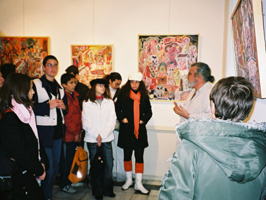 Galerie Zygos, Nikis Street, Main hall.  Ion Frantzeskakis on a children's tour during Pyrros Alexopoulos exhibition