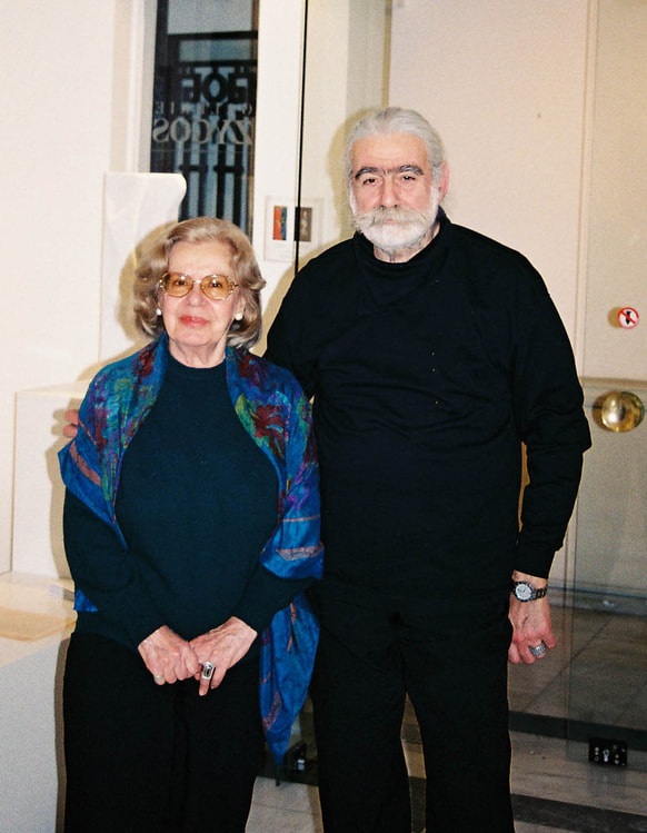 Catherine Frantzeskakis, co-founder of Galerie Zygos, with artist Carlos Cambelopoulos at Galerie Zygos, Nikis Street, 2003.